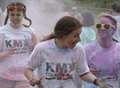 Colourful charity fun run raises £25k