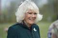 Colonel-in-chief Camilla dons regimental coat dress for Rifles visit