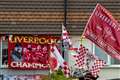 Liverpool fans urged to watch team lift Premier League trophy from home