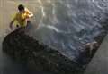 Man saves frightened dog in sea