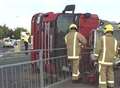 Two hurt as fire engine overturns