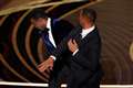 Will Smith appears to hit Chris Rock on Oscars stage after gag about wife Jada