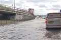 Motorists rescued from stranded vehicles after burst water main on London road