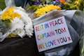 Floral tributes to Captain Tom laid at village green near his house