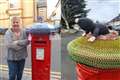 Retired police officer vows to keep town’s spirits high with post box toppers