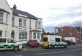 Immigration vans at Indian restaurant