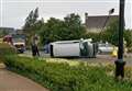 Car overturns in crash