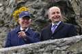 US president cheered by well-wishers waiting in the rain in Carlingford