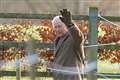 King waves as he leaves Sandringham church service