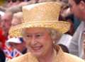 Flag-waving crowds greet the Queen