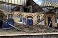 Bricks crash onto railway station platform after roof and wall collapse