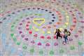 Hundreds of painted hearts welcome shoppers and visitors to Bristol city centre