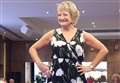 Cancer survivor struts her stuff on catwalk