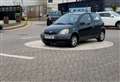 Residents baffled as car left parked in middle of roundabout