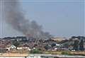 Smoke billows into sky as firefighters tackle blaze