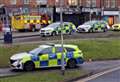 Four charged after huge police response in town centre