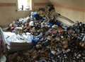 Mountain of beer cans left at flat