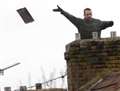 Man who threw tiles during rooftop drama is jailed