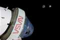 Nasa’s Orion capsule splash-lands in ‘textbook’ return to Earth from the Moon