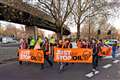 Just Stop Oil protesters block south London road with slow march