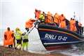 Shivering migrants brought ashore in Kent