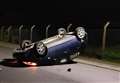 Suspected drink driver arrested after car overturns 