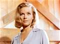 Curtain lifts at the Astor for Honor Blackman