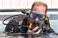 Duke of Cambridge plants coral with Earthshot Prize winner