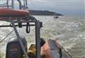 Man rescued after boat stranded at bottom of cliffs