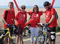 Pedalling pair put in shift for hospice 