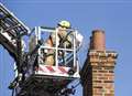 Firefighters tackle chimney fire