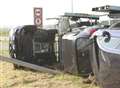 Car transporter overturns on new roundabout