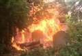 Dramatic photo shows graveyard engulfed in flames