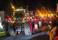 Crowds cheer on farmers in Christmas tractor parade