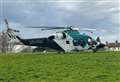 Air ambulance responding to medical incident lands in field