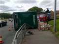 Recycling lorry overturns