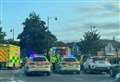 Biker treated after crash on busy roundabout