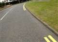 Surprise yellow line painters work around parked cars