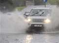 Making a splash on flooded road