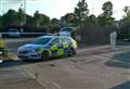 Car parked blocked off by police