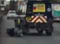 Man filmed falling off back of truck