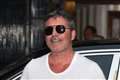 Simon Cowell tweets update after breaking part of his back in bike fall