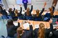 Schools should not be responsible for policing jabs for pupils, says union