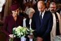 Kate lays flowers at cathedral service in memory of late Queen