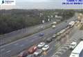 M25 closed after car flips