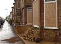 Car crashes into house as family watch TV