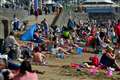 In Pictures: Life’s a beach as Britons bask in balmy March weather