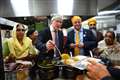 In Pictures: Swinney dishes up curry while Sunak goes back to school