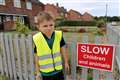 Seven-year-old boy polices drivers speeding along his road with ‘stern glare’