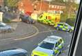 Armed police swoop on street after man sustains head injury